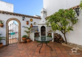 Отдельно стоящий дом с участком на продажу в городе Ayamonte Фото