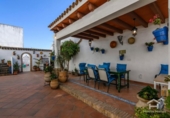 Отдельно стоящий дом с участком на продажу в городе Ayamonte Фото