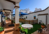 Отдельно стоящий дом с участком на продажу в городе Ayamonte Фото
