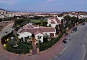 Отдельно стоящий дом с участком на продажу в городе Campo-Mijas Фото