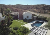Отдельно стоящий дом с участком на продажу в городе Campo-Mijas Фото
