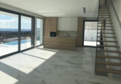 Отдельно стоящий дом с участком на продажу в городе Finestrat Фото