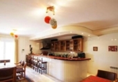 Отдельно стоящий дом с участком на продажу в городе Altea Фото