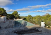 Отдельно стоящий дом с участком на продажу в городе Jávea Фото