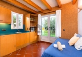 Отдельно стоящий дом с участком на продажу в городе Ciutadella de Menorca Фото