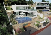 Отдельно стоящий дом с участком на продажу в городе Calpe Фото