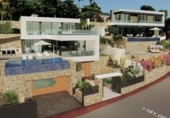 Отдельно стоящий дом с участком на продажу в городе Calpe Фото