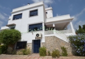 Отдельно стоящий дом с участком на продажу в городе Altea Фото