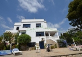 Отдельно стоящий дом с участком на продажу в городе Altea Фото