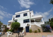 Отдельно стоящий дом с участком на продажу в городе Altea Фото