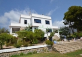 Отдельно стоящий дом с участком на продажу в городе Altea Фото