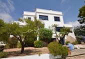 Отдельно стоящий дом с участком на продажу в городе Altea Фото