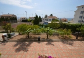 Отдельно стоящий дом с участком на продажу в городе Altea Фото
