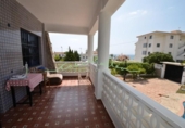 Отдельно стоящий дом с участком на продажу в городе Altea Фото