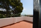 Отдельно стоящий дом с участком на продажу в городе Altea Фото