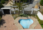 Отдельно стоящий дом с участком на продажу в городе Altea Фото