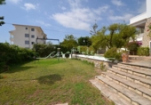 Отдельно стоящий дом с участком на продажу в городе Altea Фото