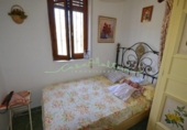Отдельно стоящий дом с участком на продажу в городе Altea Фото