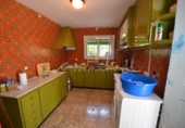 Отдельно стоящий дом с участком на продажу в городе Altea Фото
