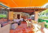 Отдельно стоящий дом с участком на продажу в городе Son Servera Фото