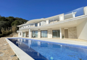 Отдельно стоящий дом с участком на продажу в городе Tossa de Mar Фото