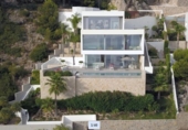 Отдельно стоящий дом с участком на продажу в городе Calpe Фото