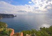Отдельно стоящий дом с участком на продажу в городе Jávea Фото