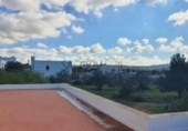Загородный дом с участком на продажу в городе Sant Antoni de Portmany Фото