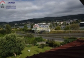 Отдельно стоящий дом с участком на продажу в городе Ferrol. Фото