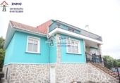 Отдельно стоящий дом с участком на продажу в городе Ferrol. Фото