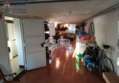 Отдельно стоящий дом с участком на продажу в городе Ferrol. Фото