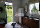 Отдельно стоящий дом с участком на продажу в городе Ferrol. Фото
