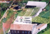 Отдельно стоящий дом с участком на продажу в городе Ferrol. Фото