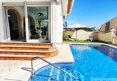 Отдельно стоящий дом с участком на продажу в городе Calpe Фото