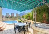 Отдельно стоящий дом с участком на продажу в городе Calpe Фото