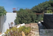 Отдельно стоящий дом с участком на продажу в городе Jávea Фото