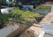 Отдельно стоящий дом с участком на продажу в городе Jávea Фото