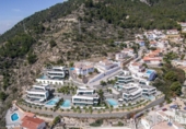 Отдельно стоящий дом с участком на продажу в городе Calpe Фото