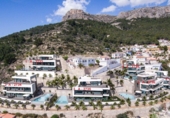 Отдельно стоящий дом с участком на продажу в городе Calpe Фото