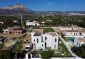 Отдельно стоящий дом с участком на продажу в городе Jávea Фото