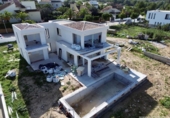 Отдельно стоящий дом с участком на продажу в городе Jávea Фото