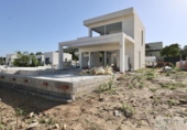 Отдельно стоящий дом с участком на продажу в городе Jávea Фото