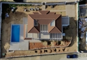 Отдельно стоящий дом с участком на продажу в городе Jávea Фото