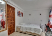 Отдельно стоящий дом с участком на продажу в городе Jávea Фото