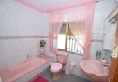 Дом с участком на продажу в городе Loja. Фото
