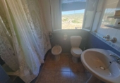 Дом с участком на продажу в городе Montefrío. Фото