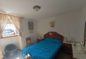Дом с участком на продажу в городе Montefrío. Фото