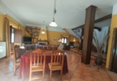 Дом с участком на продажу в городе Huétor Tájar. Фото