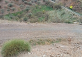 Земля на продажу у города Moclinejo. Фото
