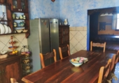 Отдельно стоящий дом с участком на продажу в городе Motril. Фото
